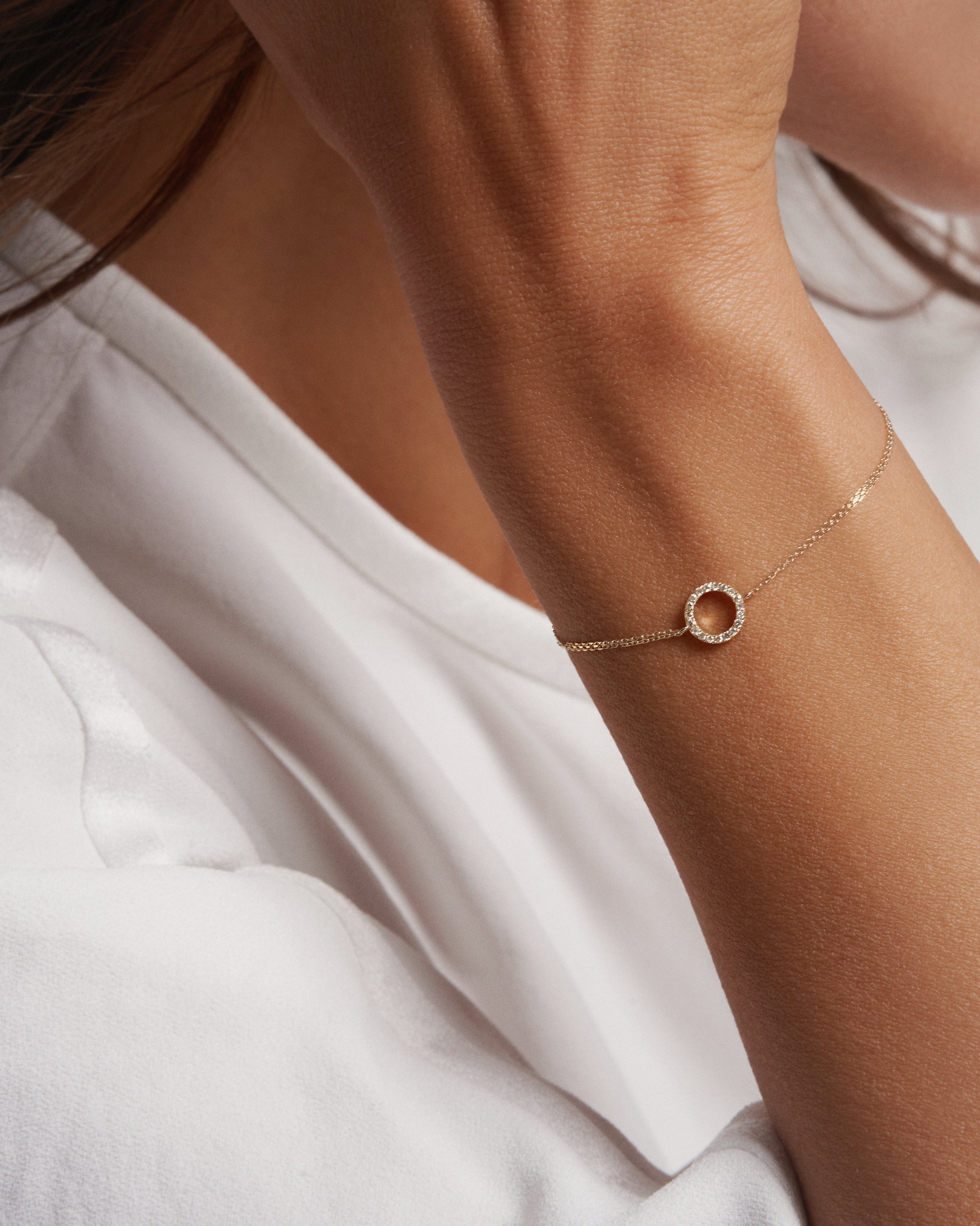 Elegant Gold Circle Bracelet with Pavé Diamonds